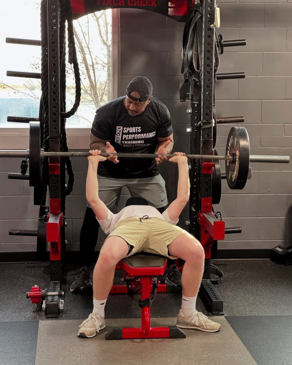 Coach and athlete working together